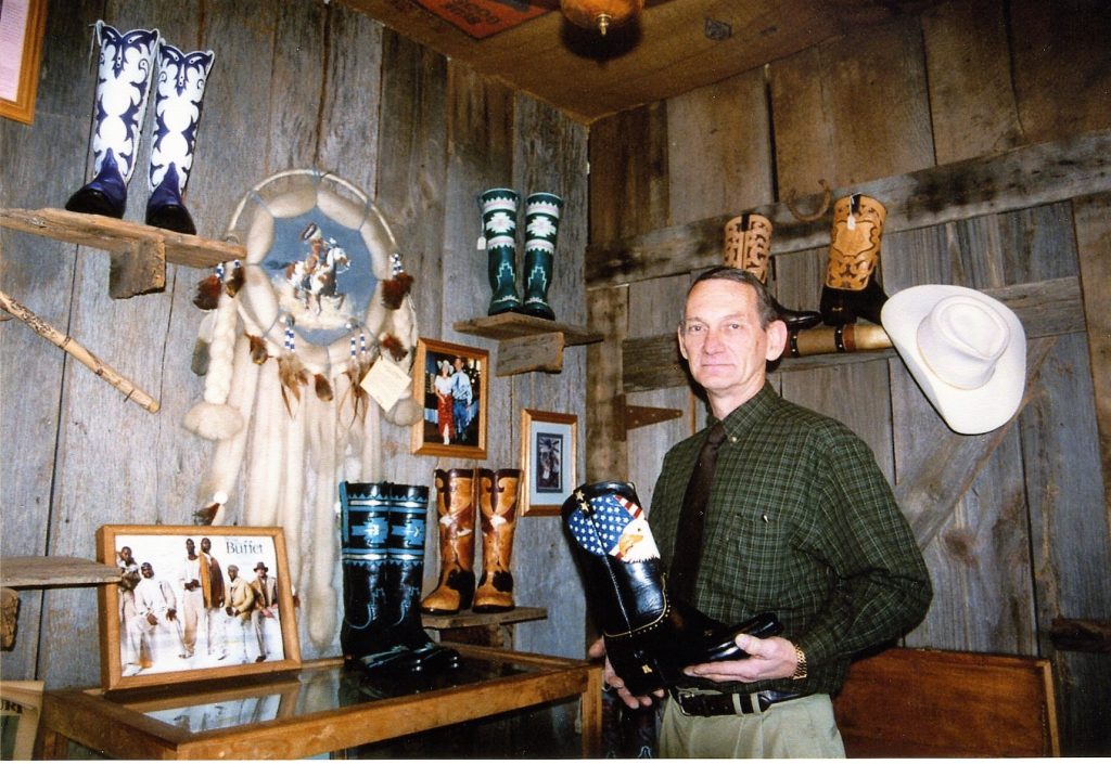 Joe poses in his showroom