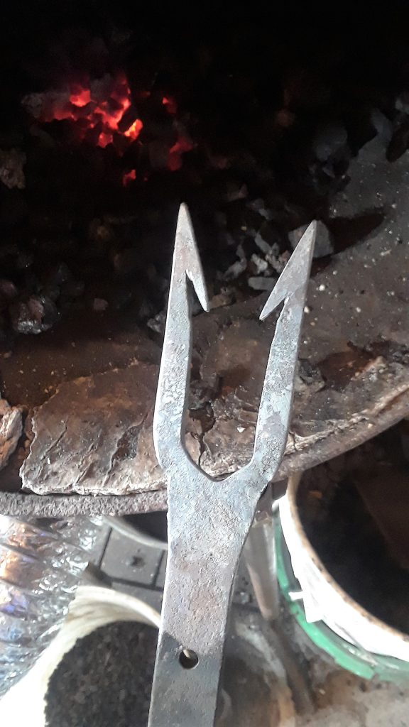 A two-prong gif near the coal fire