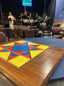Pablo Sanhueza's 2025 Fellowship plaque sits on bistro table at The Blue Room in Kansas City.